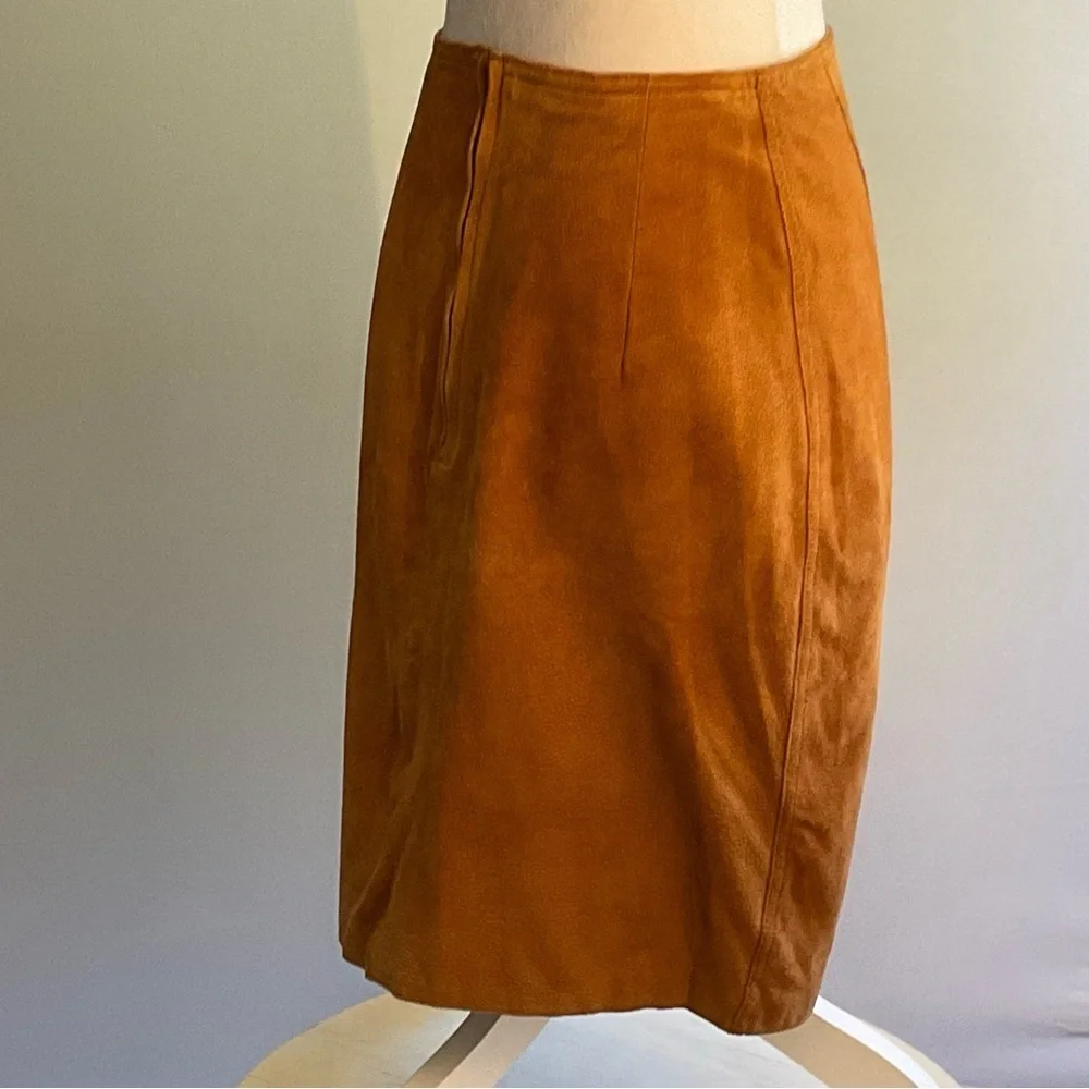 True vintage suede—real leather with clean tailoring an earlier designer era.